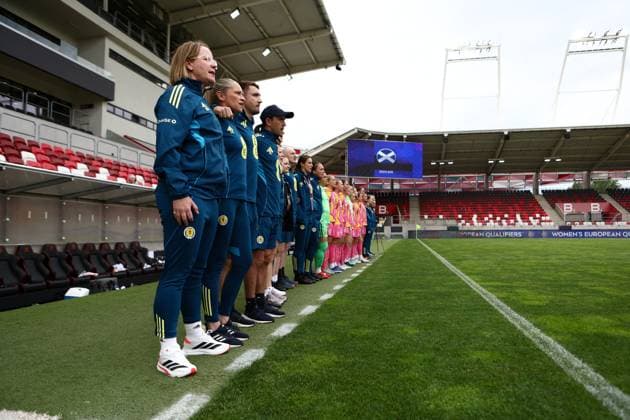 Melissa Andreatta manager of Scotland Women and backroom staff during the national anthem Scotland Women v Israel Women, FIFA 2027 Women s World Cup Qualifying, Football, Bozsnik Arena, Budapest, Hungary - 05 Jun 2026Budapest Bozsnik Arena Hungary EDITORIAL USE ONLY No use with unauthorised audio, video, data, fixture lists, club league logos or live services. Online in-match use limited to 120 images, no video emulation. No use in betting, games or single club league player publications. Copyright: xNikolaxKrstic Shutterstockx 16911189am