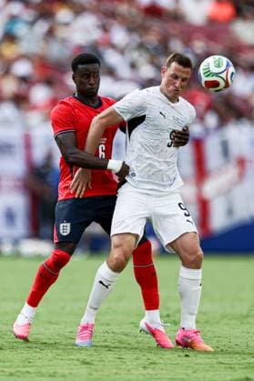 Marc Guà hi of England and Chris Wood of New Zealand England v New Zealand, International Friendly, Länderspiel, Nationalmannschaft Football, Raymond James Stadium, Tampa, Florida, USA - 06 Jun 2026Tampa Raymond James Stadium Florida (FL) United States of America EDITORIAL USE ONLY No use with unauthorised audio, video, data, fixture lists, club league logos or live services. Online in-match use limited to 120 images, no video emulation. No use in betting, games or single club league player publications. Copyright: xDustinxMarkland Shutterstockx 16912910bh