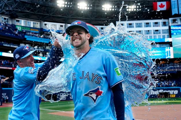 June 6, 2026, Toronto, On, CANADA: Toronto Blue Jays Myles Straw, left, douses teammate Ernie Clement with sports drink following MLB, Baseball Herren, USA baseball action against the Baltimore Orioles, in Toronto, Saturday, June 6, 2026. Canada News - June 6, 2026 - ZUMAc35_ 20260606_zaf_c35_018 Copyright: xFrankxGunnx