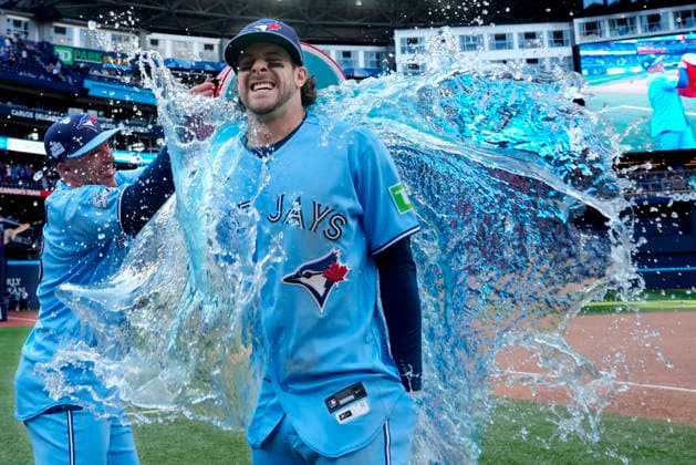 June 6, 2026, Toronto, On, CANADA: Toronto Blue Jays Myles Straw, left, douses teammate Ernie Clement with sports drink following MLB, Baseball Herren, USA baseball action against the Baltimore Orioles, in Toronto, Saturday, June 6, 2026. BBO-Blue-Jays-Clement 20260606 - ZUMAc35_ 20260606_zaf_c35_019 Copyright: xFrankxGunnx