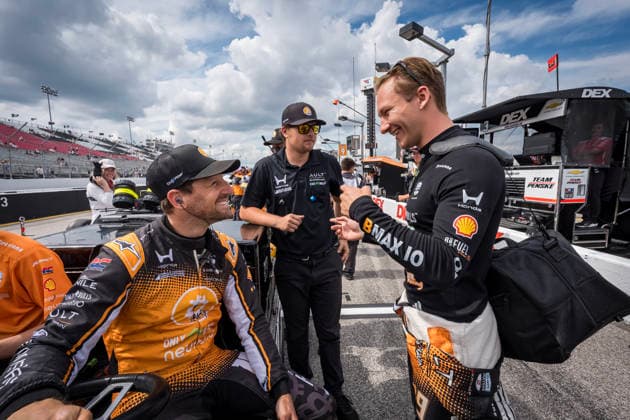 June 6, 2026, Madison, Illinois, USA: IndyCar, Indy Car, IRL, USA SERIES drivers, ROMAIN GROSJEAN (18) (CHE) of Geneva, Switzerland and DENNIS HAUGER (R) (19) (NOR) of Aurskog, Norway, talk before qualifying for the Bommarito Automotive Group 500 at World Wide Technology Raceway in MADISON Illinois. Madison USA - ZUMAa161 20260606_aaa_a161_002 Copyright: xWalterxArce GMGx