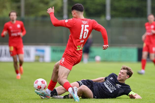from left Erblin Thaqi 1 FC Germania Egestorf Langreder, 15 and Mats Klüver SV Todesfelde, 10 in duel, duel, dynamics, action, action, match scene, 07 06 2026, Bremen Germany , Soccer, promotion round Regionalliga Nord, 1 FC Germania Egestorf Langreder SV Todesfelde xobx