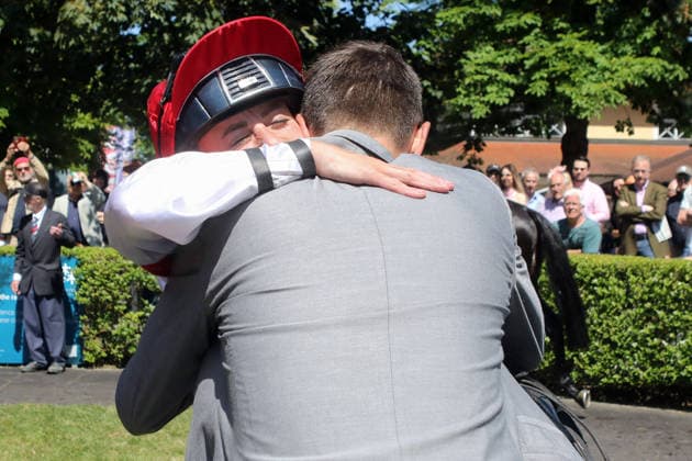 07 06 2026, Iffezheim, Baden Wuerttemberg, GER Jockey Sibylle Vogt and trainer Marcel Weiss embrace after winning the Grand Prix of Tattersalls racecourse Baden Baden, Iffezheim Jockey, trainer, Weiss, embrace, hug, emotion, joy of victory, Vogt, victory 260607B995IFFEZHEIM JPG