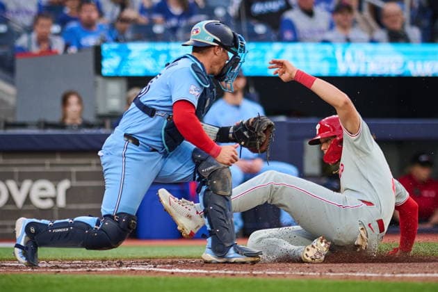 June 8, 2026, Toronto, On, Canada: Philadelphia Phillies Alec Bohm (28) is tagged out at home by Toronto Blue Jays Tyler Heineman (55) during third inning MLB, Baseball Herren, USA baseball action in Toronto, on Monday, June 8, 2026. Canada News - June 8, 2026 - ZUMAc35_ 20260608_zaf_c35_247 Copyright: xSammyxKoganx