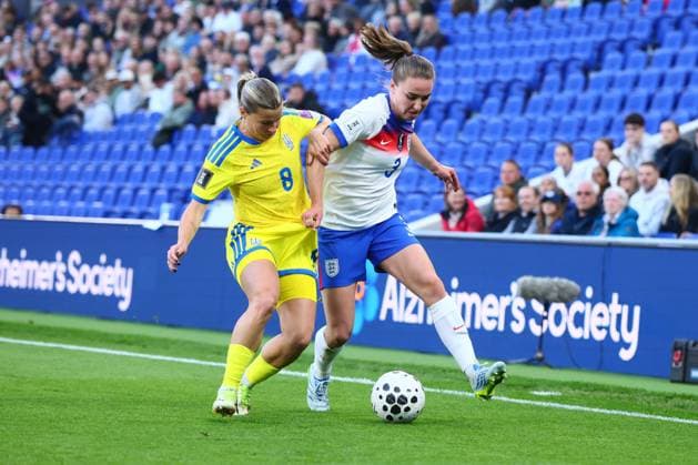 Marina Shayniuk of Ukraine and Niamh Charles of England England Women v Ukraine Women, FIFA 2027 Women s World Cup Qualifying, Football, Hill Dickinson Stadium, Liverpool, UK - 09 Jun 2026Liverpool Hill Dickinson Stadium United Kingdom EDITORIAL USE ONLY No use with unauthorised audio, video, data, fixture lists, club league logos or live services. Online in-match use limited to 120 images, no video emulation. No use in betting, games or single club league player publications. Copyright: xPaulxCurrie Shutterstockx 16919205an