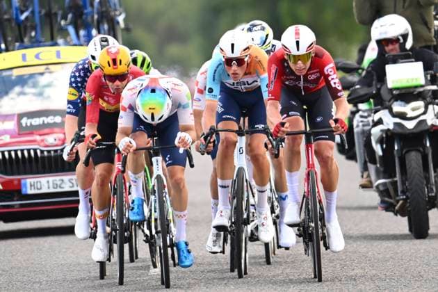 Tour Auvergne - Rhone-Alpes 2026 Stage 4 MONTROND-LES-BAINS, FRANCE - JUNE 10 : Simmons Quinn (USA) of Lidl - Trek, Fisher-Black Finn (NZL) of Red Bull - BORA - Hansgrohe, Kron Andreas (DEN) of UNO-X Mobility, Castrillo Pablo (ESP) of Movistar Team, Garcia Pierna Raul (ESP) of Movistar Team, Craps Lars (BEL) of Lotto Intermarche, Jegat Jordan (FRA) of TotalEnergies, Vercher Matteo (FRA) of TotalEnergies, Castellon Jan (ESP) of Caja Rural - Seguros RGA, Frigo Marco (ITA) of NSN Cycling Team during stage 4 of the 78th edition of Tour Auvergne - Rhone-Alpes an UCI World Tour 2.UWT cycling road race stage for Men Elite of 167.4 km with start in Le Puy-en-Velay and finish in Montrond-les-Bains on June 10, 2026 in Montrond-les-Bains, France, 10 06 2026 ( Motordriver Guy De Vuyst - Montrond-les-Bains France Copyright: xVincentxKalutx