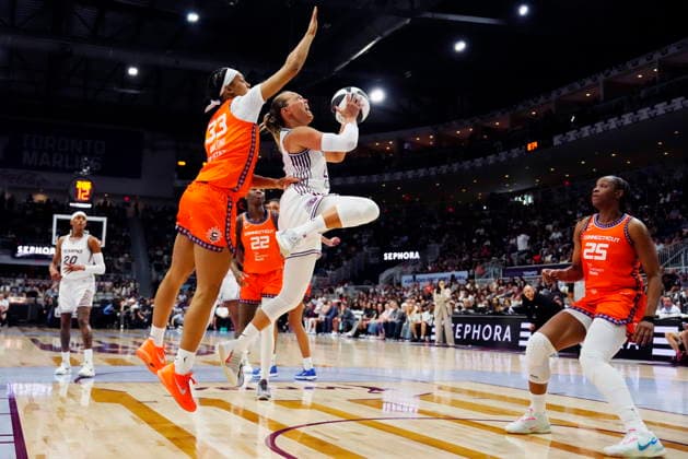 June 10, 2026, Toronto, On, CANADA: Toronto Tempo s Julie Allemand (22) jumps for the shot as Connecticut Sun s Nell Angloma (33) tries to defend during second half WNBA, Basketball Damen, USA action in Toronto, Wednesday, June 10, 2026. Canada News - June 10, 2026 - ZUMAc35_ 20260610_zaf_c35_207 Copyright: xFrankxGunnx