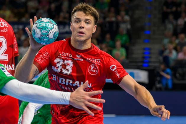 Pictured, from left: Aaron Mensing, MT Melsungen, 33, GER, Berlin, handball, Füchse Berlin vs. MT Melsungen, at the Max Schmeling Halle, August 27, 2026, Copyright: HMBxMedia UwexKoch