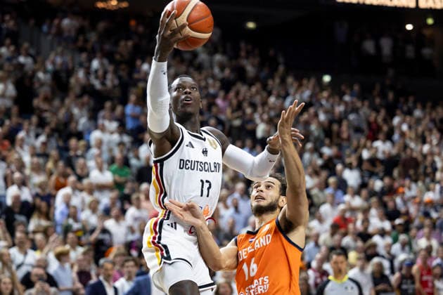 Dennis SCHROEDER SCHRÖDER GER, 17, left, with the ball, in a one-on-one matchup against Troy KOEHLER NED, 16, right, in action, international basketball game, World Cup qualifier, Germany (GER) vs. the Netherlands (NED), final score 99–83, FIBA Basketball World Cup European Qualifiers, 2nd Round, Group K, on August 27, 2026, at the Lanxess Arena in Cologne