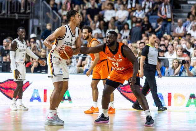August 27, 2026, GER, FIBA 2027 Basketball World Cup, European Qualifiers, Cologne, Germany vs. Turkey, Oscar Da Silva (Germany), 1, Nathan Kuta (Netherlands), 99, Cologne, LANXESS Arena, North Rhine-Westphalia, Germany