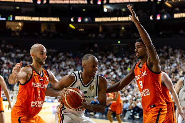 August 27, 2026, GER, FIBA 2027 Basketball World Cup, European Qualifiers, Cologne, Germany: Turkey vs. Germany; Louis Olinde (Germany, 16) in a head-to-head matchup against Marijn Ververs (Netherlands, 7) and David N. Guessan (Netherlands, 3); Cologne, LANXESS Arena, North Rhine-Westphalia, Germany