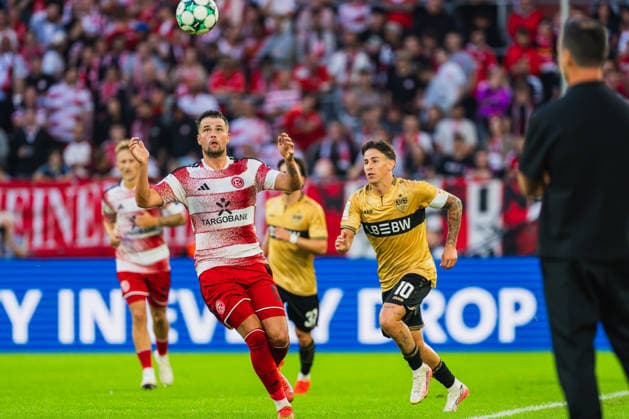 Yassine Bouchama of Fortuna Düsseldorf (No. 05) tries to head the ball down, Nicolas Sessa, VFB Stuttgart II, 10. Fortuna Düsseldorf vs. VFB Stuttgart II, soccer, 3. Liga, Matchday 3, 2026–27 season, August 28, 2026, DFL REGULATIONS PROHIBIT ANY USE OF PHOTOGRAPHS AS IMAGE SEQUENCES AND OR QUASI-VIDEO, Fortuna Düsseldorf vs. VFB Stuttgart II, Soccer, 3rd Division, Matchday 3, 2026–27 Season, August 28, 2026, Düsseldorf Copyright: xEibner-Pressefoto LukasxBaldygax EP_LBA