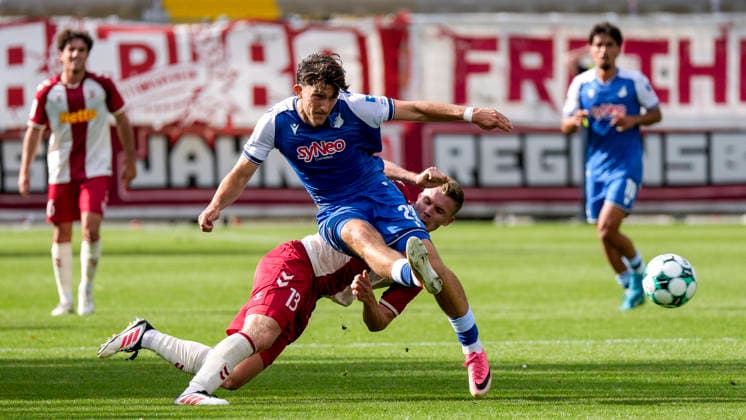 From left: Erik Majetschak (Regensburg), 13; Florian Micheler (TSG II), 28; tackle, game scene, duel, tackle, tackling, dynamic, action, 08 29 2026, Sinsheim, Germany, soccer, 3rd League, TSG 1899 Hoffenheim II vs. SSV Jahn Regensburg, DFB and DFL regulations prohibit any use of photographs as image sequences and or quasi-video xozx