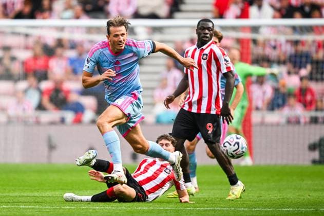 Trai Hume of Sunderland tackles Sander Berge of Fulham Sunderland v Fulham, Premier League Football, Football, Stadium of Light, Sunderland, UK - 30 Aug 2026Sunderland Stadium of Light United Kingdom EDITORIAL USE ONLY No use with unauthorised audio, video, data, fixture lists, club league logos or live services. Online in-match use limited to 120 images, no video emulation. No use in betting, games or single club league player publications. Copyright: xGreigxCowie Shutterstockx 17119085ch