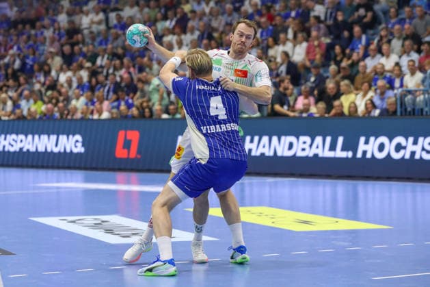 August 30, 2026, xgox, Handball Opel HBL VfL Gummersbach vs. SC Magdeburg, emspor, from left: Felix Claar (Magdeburg), 7, Ellidi Snaer Vidarsson (Gummersbach), 4; duel, battle, tackle, Gummersbach