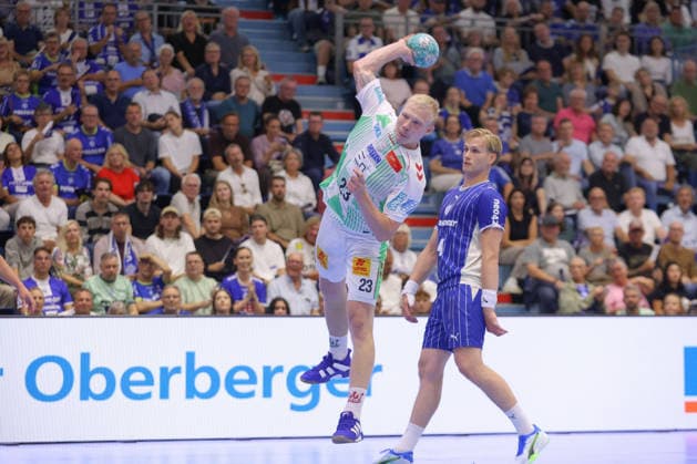 August 30, 2026, xtgx, Opel HBL Handball, VfL Gummersbach vs. SC Magdeburg emspor, from left: Magnus Saugstrup (Magdeburg), 23, takes a shot, goal scorer, scores a goal, Gummersbach