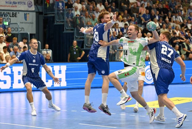 Tom Kiesler (VfL Gummersbach), 30, and Kristjan Horzen (VfL Gummersbach), 27, vs. Omar Ingi Magnusson (SC Magdeburg), 14, GER, VfL Gummersbach vs. SC Magdeburg, 1 Handball, Opel Bundesliga, VfL Gummersbach, 1st Division, 2026–2027 season, Matchday 1, Schwalbe Arena, Gummersbach, August 30, 2026, GER, VfL Gummersbach vs. SC Magdeburg, Handball 1, Opel Bundesliga, VfL Gummersbach, 1st League, 2026–2027 season, Matchday 1, Schwalbe Arena, Gummersbach, August 30, 2026, Gummersbach Copyright: xEibner-Pressefoto JuergenxAugstx EP_JAT