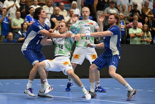 Miro Schluroff (VfL Gummersbach), 15, and Tom Kiesler (VfL Gummersbach), 30, vs. Omar Ingi Magnusson (SC Magdeburg), 14 (GER), VfL Gummersbach vs. SC Magdeburg, Handball, Opel Bundesliga, VfL Gummersbach, 1st Division, 2026–2027 season, Matchday 1, Schwalbe Arena, Gummersbach, August 30, 2026, GER, VfL Gummersbach vs. SC Magdeburg, Handball, Opel Bundesliga, VfL Gummersbach, 1st League, 2026–2027 season, Matchday 1, Schwalbe Arena, Gummersbach, August 30, 2026, Gummersbach Copyright: xEibner-Pressefoto JuergenxAugstx EP_JAT