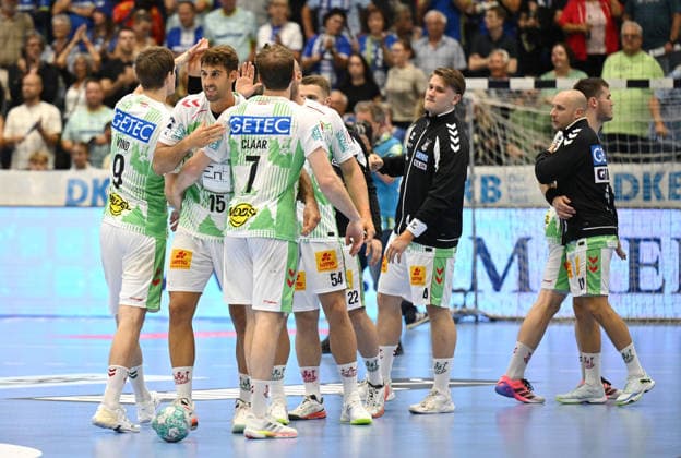 The SC Magdeburg team wins the season opener of the Opel Handball Bundesliga on the road against VfL Gummersbach, 33–31 (GER), VfL Gummersbach vs. SC Magdeburg, Handball, Opel Bundesliga, VfL Gummersbach, 1st Division, 2026–2027 season, Matchday 1, Schwalbe Arena, Gummersbach, August 30, 2026 (GER), VfL Gummersbach vs. SC Magdeburg, Handball 1, Opel Bundesliga, VfL Gummersbach, 1st Division, 2026–2027 season, Matchday 1, Schwalbe Arena, Gummersbach, August 30, 2026, Gummersbach Copyright: xEibner-Pressefoto JuergenxAugstx EP_JAT