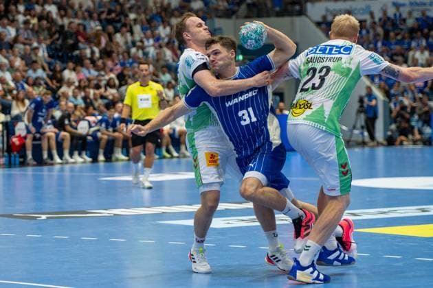 Kay Smits, backcourt player, VfL Gummersbach 31, Magnus Saugstrup, pivot, SC Magdeburg 23, VfL Gummersbach vs. SC Magdeburg, Opel Handball Bundesliga, Men s, Matchday 1, August 30, 2026, Gummersbach, North Rhine-Westphalia, Germany Copyright: xkolbert-press MartinxWdziecznyx