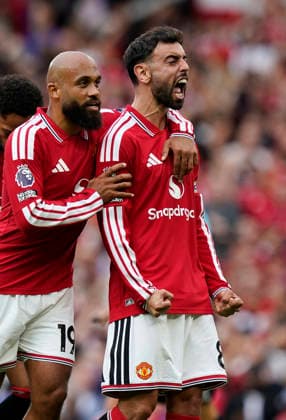 Manchester, England, 30th August 2026. Bruno Fernandes of Manchester United, ManU celebrates scoring the third from the penalty spot during the Manchester United vs Ipswich Town Premier League match at Old Trafford, Manchester. Picture credit should read: Andrew Yates Sportimage EDITORIAL USE ONLY. No use with unauthorised audio, video, data, fixture lists, club league logos or live services. Online in-match use limited to 120 images, no video emulation. No use in betting, games or single club league player publications. SPI_067_AY_Man_Utd_Ipswich SPI-4945-0067