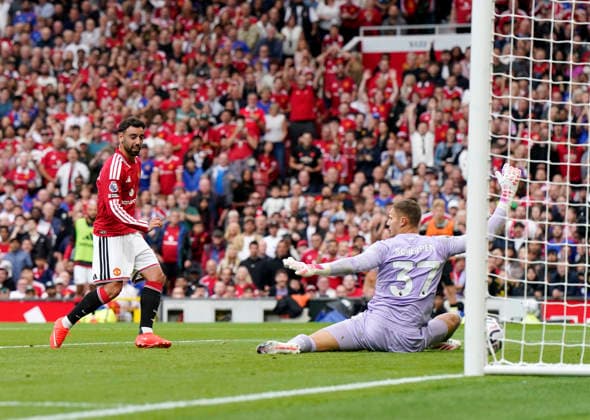 Manchester, England, 30th August 2026. Bruno Fernandes of Manchester United, ManU scores the fourth goal and his hatrick goal during the Manchester United vs Ipswich Town Premier League match at Old Trafford, Manchester. Picture credit should read: Andrew Yates Sportimage EDITORIAL USE ONLY. No use with unauthorised audio, video, data, fixture lists, club league logos or live services. Online in-match use limited to 120 images, no video emulation. No use in betting, games or single club league player publications. SPI_073_AY_Man_Utd_Ipswich SPI-4945-0073
