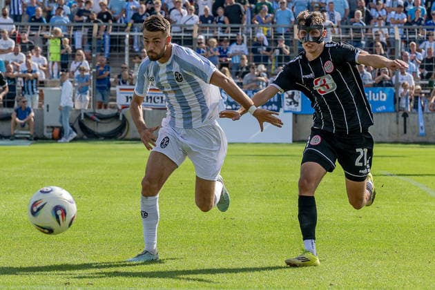 Battle for the Ball: Tackle between Raphael Wach (TSV 1860 Munich, No. 08) and Kilian Pittrich (TSV 1882 Landsberg, No. 21), GER, TSV 1860 Munich vs. TSV Landsberg 1882, soccer, Bavarian Regional League, Matchday 6, 2026–2027 season, August 30, 2026 DFL and DFB regulations prohibit any use of photographs as image sequences and or quasi-video. Photo: HMB Media, Heike Feiner Copyright: HMBxMedia HeikexFeiner
