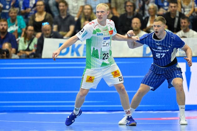 Gummersbach, Schwalbe Arena, August 30, 2026, GER, Men s Handball Bundesliga, Opel HBL, 2026–2027 season, VfL Gummersbach vs. SC Magdeburg. Pictured from left: Magnus SAUGSTRUP (Magdeburg) and Kristjan HORZEN (Gummersbach), North Rhine-Westphalia, Germany