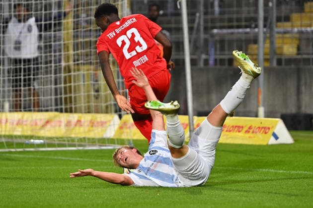 Daniel MUTEBA (Buchbach), Action, Tackle against Fabio WAGNER (TSV 1860 Munich), Foul leading to a penalty kick, Penalty kick, Penalty area play, Soccer, Bavarian State Cup, Toto Cup: TSV 1860 Munich vs. TSV Buchbach on September 1, 2026, at Grünwalder Stadium