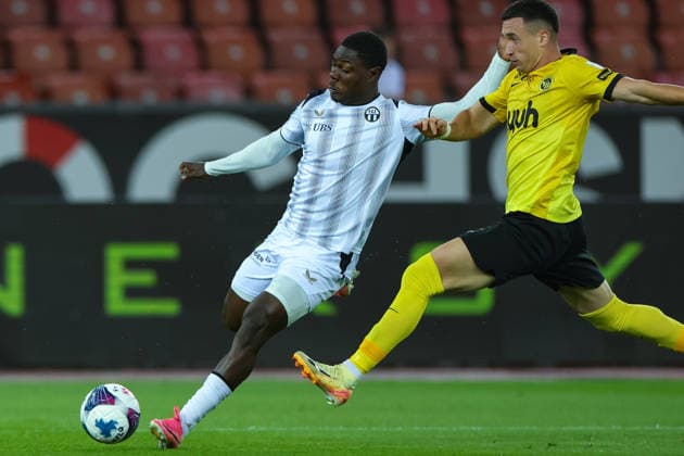 September 1, 2026, Soccer, Brack Super League 2026–27, Round 6, FC Zurich vs. BSC Young Boys, Letzigrund Stadium, Zurich, Switzerland. Umeh Emmanuel (11), FC Zurich, on the left, in a tackle with Stefan Bukinac (33), BSC Young Boys. Photo by Urs Ottiger