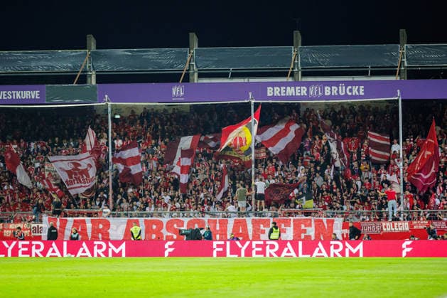 The visitors section with fans of FC Bayern Munich (GER), VfL Osnabrück vs. FC Bayern Munich, soccer, DFB Cup, 1st round, 2026–2027 season, September 2, 2026 DFL regulations prohibit the use of photographs as image sequences and or quasi-video GER, VfL Osnabrück vs. FC Bayern Munich, soccer, DFB Cup, Round 1, 2026–2027 season, September 2, 2026 Osnabrück Copyright: xEibner-Pressefoto JanxRollingerx EP_JSK
