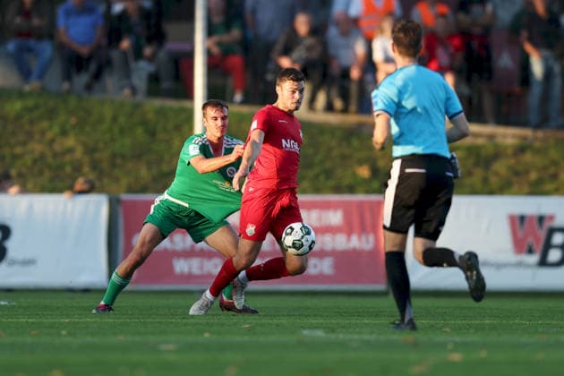 September 4, 2026, Men s, Soccer, 2026–2027 season, Bavarian Regional League, Matchday 7: TSV Aubstadt vs. SpVgg Ansbach; Lukas Oberseider (15), SpVgg Ansbach, and Max Grimm (9), TSV Aubstadt; Sulzfeld School Stadium, Aubstadt; NGN Arena, Bavaria, Germany