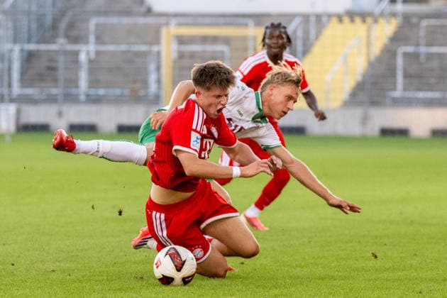 Matous Srb 11, FC Bayern Munich Amateurs; Elias Herger 11, VfB Eichstätt, tackle; FC Bayern II vs. VfB Eichstätt, soccer, Bavarian Regional League, Matchday 7, September 4, 2026 DFB regulations prohibit any use of photographs as image sequences and or quasi-video Munich, Bavaria, Germany Copyright: xkolbert-press UlrichxGamelx