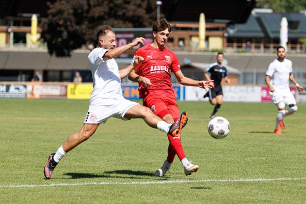3Tizian Zimmermann 22, TSV Buchbach, and Jeton Abazi 9, TSV Landsberg, in the match between TSV Landsberg and TSV Buchbach, soccer, men s, Bavarian Regional League, 2026–2027, Matchday 7 on September 5, 2026, in Landsberg am Lech, Sportpark, Bavaria, Germany