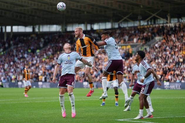 Hull City s Oli McBurnie, centre left, jumps for the ball against Aston Villa s Tyrone Mings, centre right, during the Premier League match between Hull City and Aston Villa at the MKM Stadium, Hull, Saturday, Aug. 5, 2026. (Photo Jon Super) Hull City v Aston Villa, Premier League, Football, Football, MKM Stadium, Hull, UK - 05 Sep 2026Hull MKM Stadium United Kingdom EDITORIAL USE ONLY No use with unauthorised audio, video, data, fixture lists, club league logos or live services. Online in-match use limited to 120 images, no video emulation. No use in betting, games or single club league player publications. Copyright: xJonxSuper Shutterstockx 17135027bk