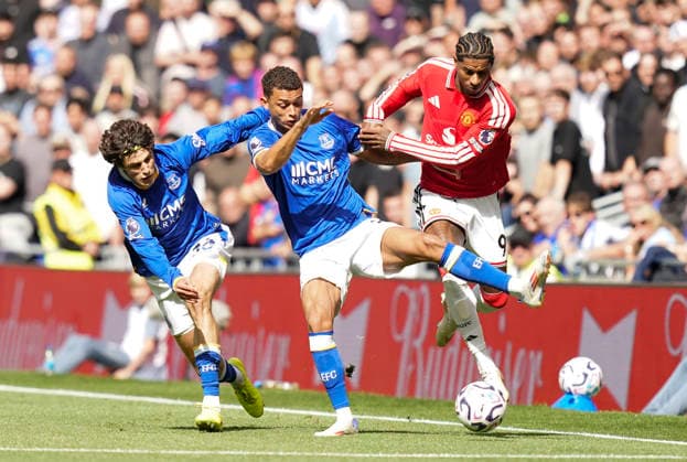 Liverpool, England, 6th September 2026. Marcus Rashford of Manchester United, ManU (R) is challenged by Brennan Johnson of Everton (C) and Merlin Rohl of Everton during the Everton vs Manchester United Premier League match at Hill Dickinson Stadium, Liverpool. Picture credit should read: Andrew Yates Sportimage EDITORIAL USE ONLY. No use with unauthorised audio, video, data, fixture lists, club league logos or live services. Online in-match use limited to 120 images, no video emulation. No use in betting, games or single club league player publications. SPI_004_AY_EVERTON_MAN_UTD SPI-4979-0004