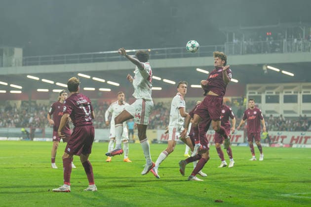 Enzo Wirtz (Fortuna Cologne), No. 9, rises highest in the fog ahead of Lukas Eixler (Fortuna Düsseldorf), No. 11. Fortuna Cologne vs. Fortuna Düsseldorf, Soccer, 3rd Division, Matchday 4, 2026–27 Season, September 6, 2026, DFL regulations prohibit any use of photographs as image sequences and or quasi-video, Fortuna Cologne vs. Fortuna Düsseldorf, soccer, 3. Liga, Matchday 4, 2026–27 Season, September 6, 2026, Cologne Copyright: xEibner-Pressefoto LukasxBaldygax EP_LBA