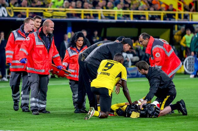 September 8, 2026, Soccer, UEFA Champions League, Borussia Dortmund vs. Villarreal CF, Champions League Matchday 1, Signal Iduna Park, 2026–27 season: Konstantinos Karetsas (BVB) 19, injured on the field, lying on the ground; must be carried off the field on a stretcher by paramedics. DFB regulations prohibit any use of photographs as image sequences and or quasi-video. North Rhine-Westphalia, Germany