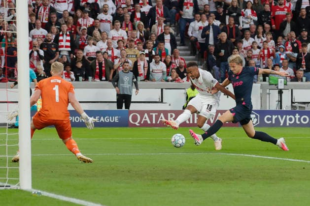 In the photo, from left: Goalie Arild Ostbo (Viking FK, 1), Jamie Leweling (VfB Stuttgart, 18) taking a shot on goal, and Jesper Daland (Viking FK, 27) — no goal — September 9, 2026, VfB Stuttgart vs. Viking FK, UEFA Champions League, Matchday 1, Germany, Stuttgart, MHP Arena, DFL REGULATIONS PROHIBIT ANY USE OF PHOTOGRAPHS AS IMAGE SEQUENCES AND OR QUASI-VIDEO Copyright: HMBxMedia xJulienxBecker