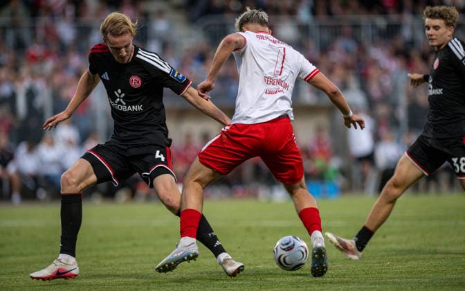 Soccer, 2026–2027 Season, Lower Rhine Cup, September 9, 2026, First Round, Men s, SV Biemenhorst White vs. Fortuna Düsseldorf Black; from left: Lukas Bornschein (Fortuna Düsseldorf), Max Peerenboom (SV Biemenhorst), Bocholt, Stadion am Huenting, Germany 260909_fb_sv-biemenhorst_fortuna-duesseldorf_58637