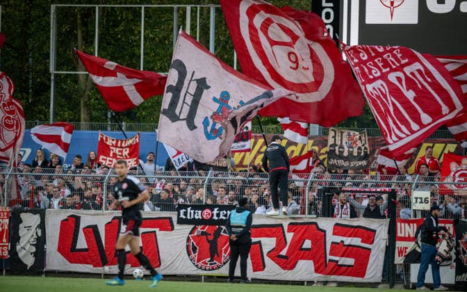 Soccer, 2026–2027 Season, Lower Rhine Cup, September 9, 2026, First Round, Men s Division, SV Biemenhorst (White) vs. Fortuna Düsseldorf (Black), Fortuna Bocholt fans, Stadion am Huenting, Germany 260909_fb_sv-biemenhorst_fortuna-duesseldorf_58623