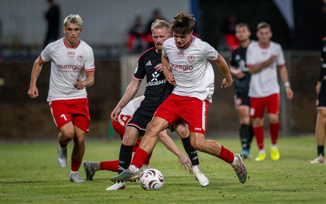 Soccer, 2026–2027 Season, Lower Rhine Cup, September 9, 2026, First Round, Men’s, SV Biemenhorst White vs. Fortuna Düsseldorf Black; from left: Jomaine Consbruch (Fortuna Düsseldorf), Ferdinand Schulte (SV Biemenhorst), Bocholt, Stadion am Huenting, Germany 260909_fb_sv-biemenhorst_fortuna-duesseldorf_58643
