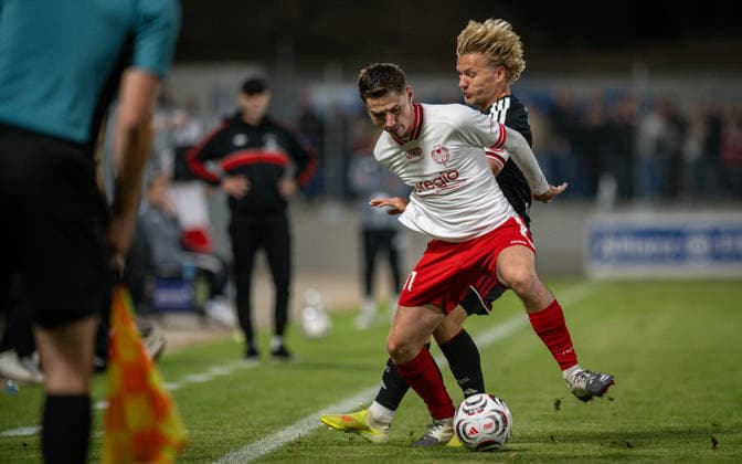Soccer, 2026–2027 Season, Lower Rhine Cup, September 9, 2026, First Round, Men’s, SV Biemenhorst White vs. Fortuna Düsseldorf Black; from left: Taric Boland (SV Biemenhorst), Andreas Mueller (Fortuna Düsseldorf); Bocholt, Stadion am Huenting, Germany 260909_fb_sv-biemenhorst_fortuna-duesseldorf_58702