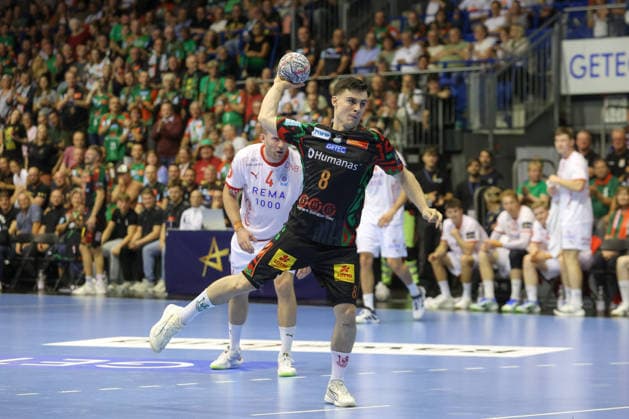 September 9, 2026, xtgx, Handball Champions League, SC Magdeburg vs. Kolstad Handbold emspor, from left: Tim Thielecke (Magdeburg), 8 shots on goal, goal scorer, scores a goal, goal, scores the goal (seven-meter throw, Magdeburg)