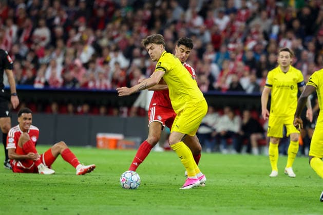 Tackle, Aleksandar Pavlovic (FC Bayern Munich), 45, vs. Villads Nielsen (FK Bodo Glimt), 02, GER, FC Bayern Munich vs. FK Bodo Glimt, Soccer, UEFA Champions League, Group Stage, Matchday 1, 2026–2027 season, September 10, 2026, GER, FC Bayern Munich vs. FK Bodo Glimt, Soccer, UEFA Champions League, Group Stage, Matchday 1, 2026–2027 Season, September 10, 2026, Munich Copyright: xEibner-Pressefoto JennixMaulx EP_JML