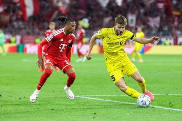 Tackle, Fredrik Bjoerkan (FK Bodo Glimt, No. 15) vs. Michael Olise (FC Bayern Munich, No. 17), GER, FC Bayern Munich vs. FK Bodo Glimt, Soccer, UEFA Champions League, Group Stage, Matchday 1, 2026–2027 season, September 10, 2026, GER, FC Bayern Munich vs. FK Bodo Glimt, Soccer, UEFA Champions League, Group Stage, Matchday 1, 2026–2027 season, September 10, 2026, Munich Copyright: xEibner-Pressefoto JennixMaulx EP_JML