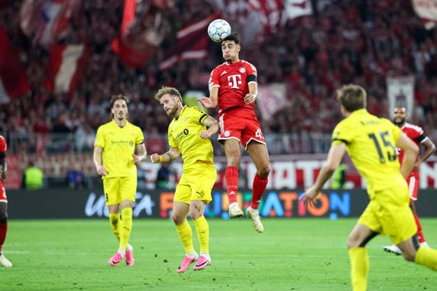 Heading duel: Aleksandar Pavlovic (FC Bayern Munich, No. 45) vs. Ole Didrik Blomberg (FK Bodo Glimt, No. 11), GER, FC Bayern Munich vs. FK Bodo Glimt, Soccer, UEFA Champions League, Group Stage, Matchday 1, 2026–2027 Season, September 10, 2026, GER, FC Bayern Munich vs. FK Bodo Glimt, soccer, UEFA Champions League, group stage, Matchday 1, 2026–2027 season, September 10, 2026, Munich Copyright: xEibner-Pressefoto JennixMaulx EP_JML