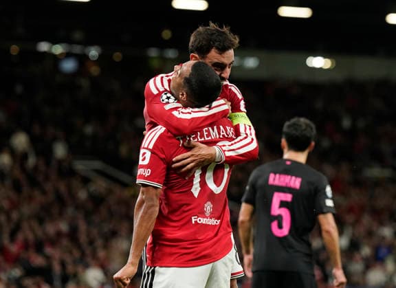Manchester, England, 10th September 2026. Second goal scorer Bruno Fernandes of Manchester United, ManU celebrates with Youri Tielemans of Manchester United during the Manchester United vs Sabah UEFA Champions League match at Old Trafford, Manchester. Picture credit should read: Andrew Yates Sportimage EDITORIAL USE ONLY. No use with unauthorised audio, video, data, fixture lists, club league logos or live services. Online in-match use limited to 120 images, no video emulation. No use in betting, games or single club league player publications. SPI_033_AY_Man_Utd_Sabah SPI-4989-0033