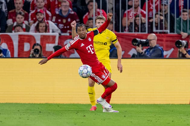 Battle for the Ball: Tackle between Michael Olise of FC Bayern Munich, 17, and Fredrik Bjorkan of FK Bodo Glimt, 15 (GER), FC Bayern Munich vs. FK Bodo Glimt, Soccer, UEFA Champions League, Group Stage, Matchday 1, 2026–2027 season, September 10, 2026. DFL and DFB regulations prohibit any use of photographs as image sequences and or quasi-video. Photo: HMB Media, Heike Feiner Copyright: HMBxMedia HeikexFeiner