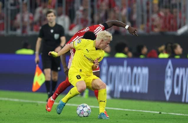 September 10, 2026, GER, Soccer, Men s, UEFA Champions League, Group Stage, 2026–2027 Season, Matchday 1, FC Bayern Munich vs. FK Bodø Glimt: Sondre Auklend (FK Bodø Glimt 08) in a duel with Alphonso Davies, FC Bayern Munich 19, Munich, Allianz Arena, Bavaria, Germany Copyright: xNordphoto Schneiderx